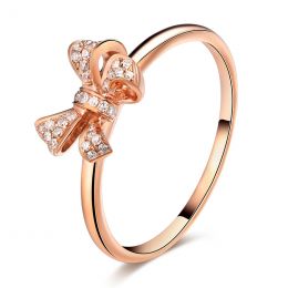 Bague petit noeud Or rose 18cts. Diamants 0.080ct