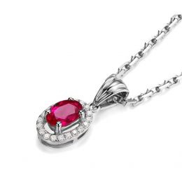 Pendentif Madame Or blanc 18 carats. Rubis ovale diamants pendeloque