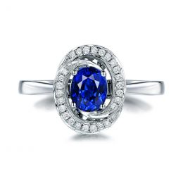 Bague saphir bleu. Or blanc, diamants myriade