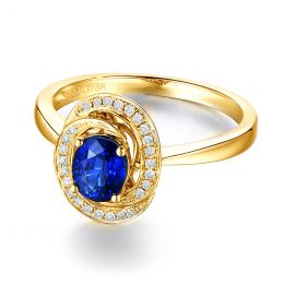 Bague saphir bleu. Or jaune, diamants myriade