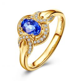 Bague fiançailles saphir diamants et or jaune. Motifs bouclés