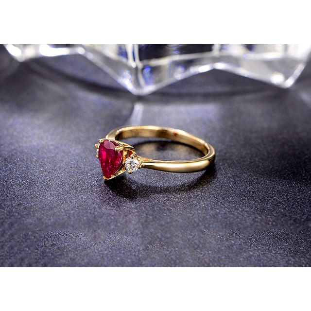 Bague Amour. Or jaune, rubis 1ct taillé en poire, diamants