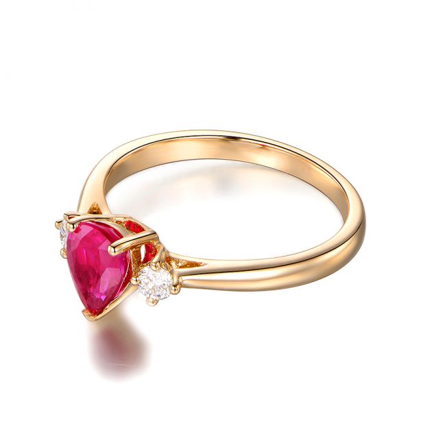 Bague Amour. Or jaune, rubis 1ct taillé en poire, diamants