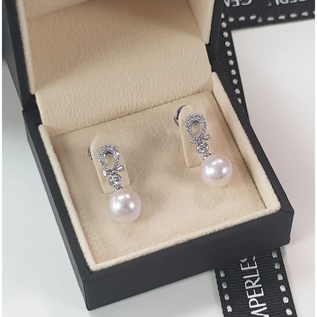 Boucles d'oreilles bambou. Or blanc, perles et diamants