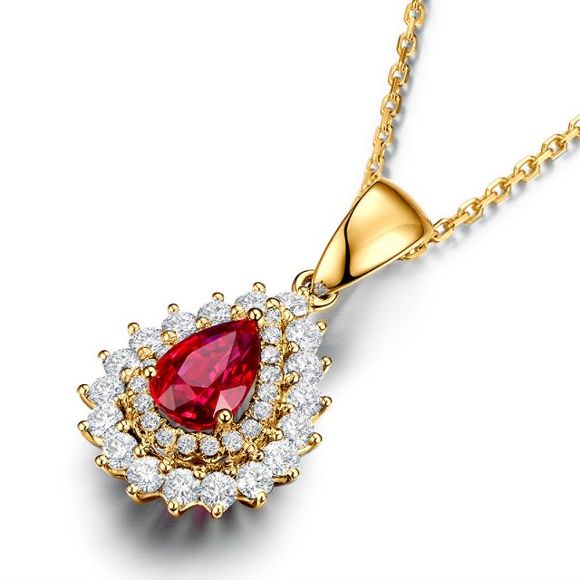 Pendentif rubis rouge vif taillé poire. Diamants sertis et Or jaune