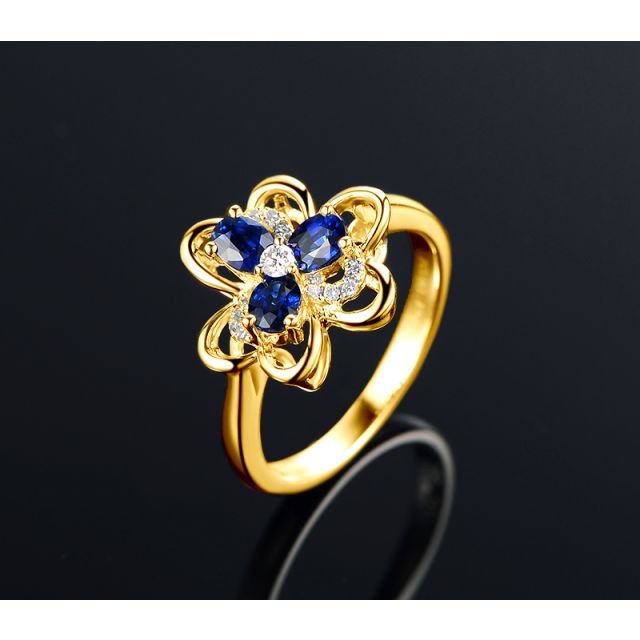 Bague fleur Or jaune fleur anémone. Diamants, saphirs