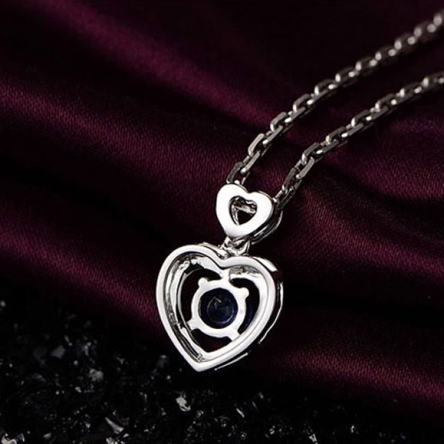 Pendentif Coeur saphir et diamants. Or blanc