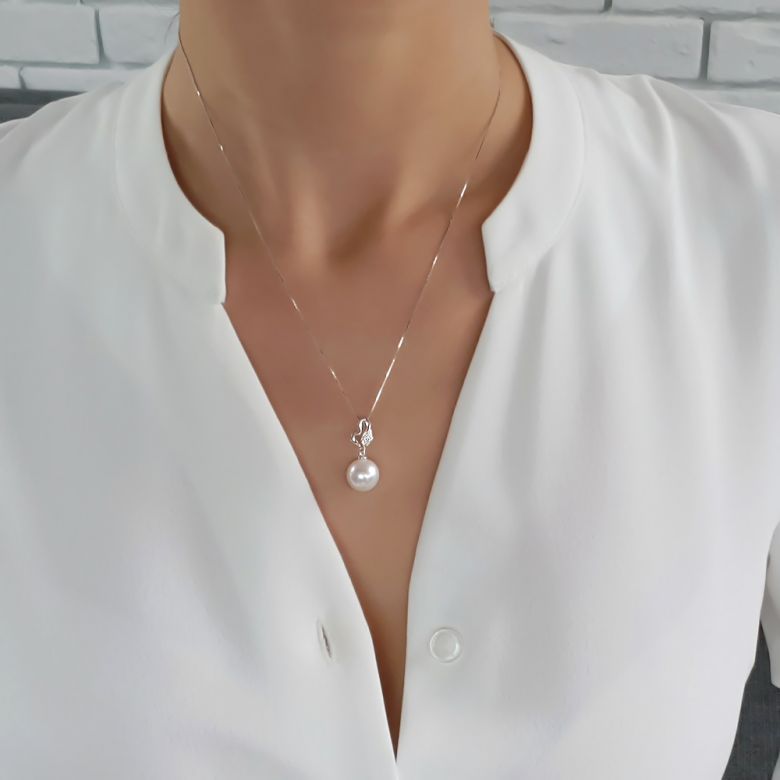 Pendentif jeune pousse printanière - Or blanc et perle - 7 diamants - 6