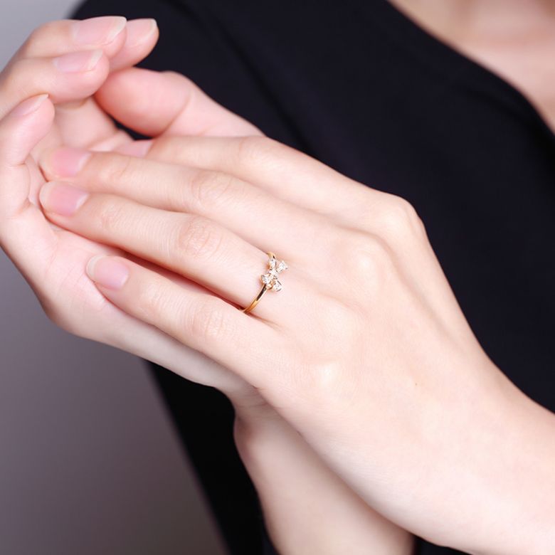 Bague petit noeud Or jaune 18cts. Diamants 0.080ct - 2