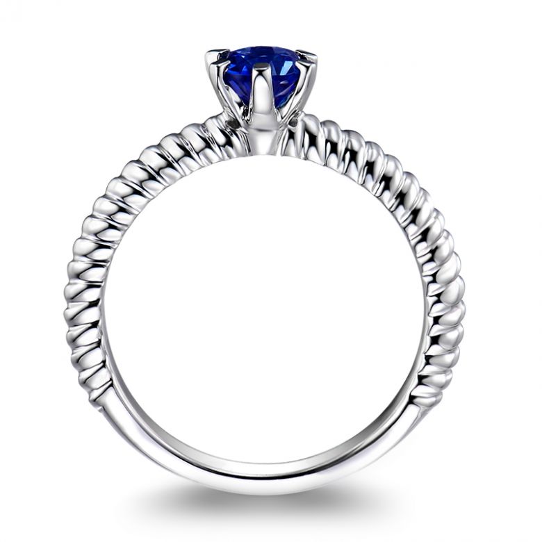 Bague or blanc monture torsadée. Saphir bleu 0.55ct - 5