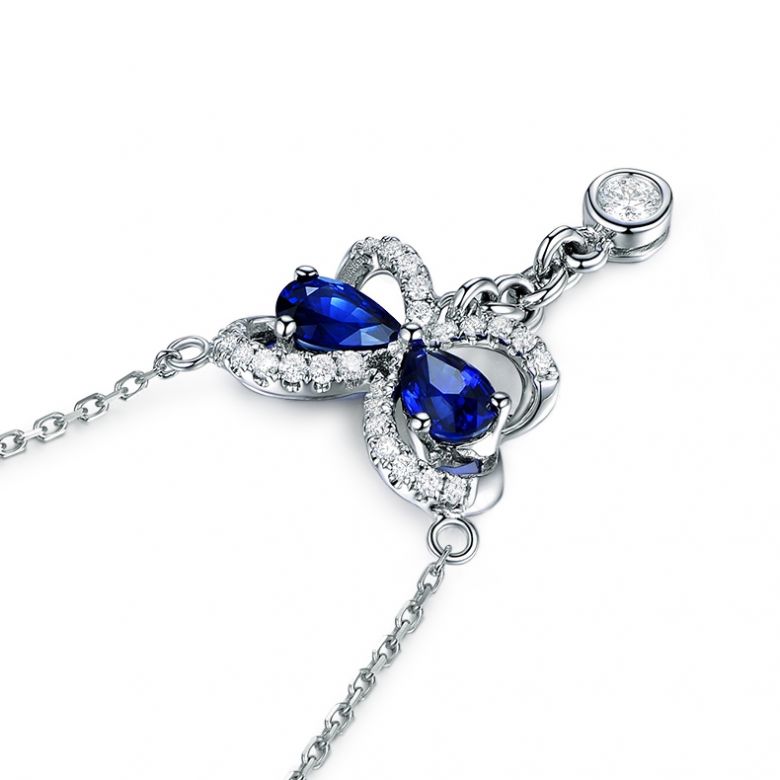 Pendentif papillon saphirs et diamants. Or blanc 18cts - 6
